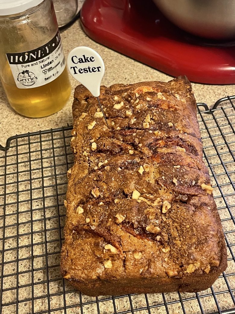 Apple walnut loaf cooling on a wire rack