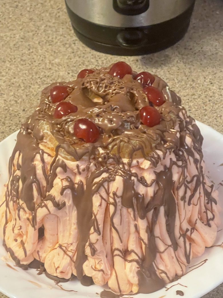 Cherry birthday cake with chocolate drizzle